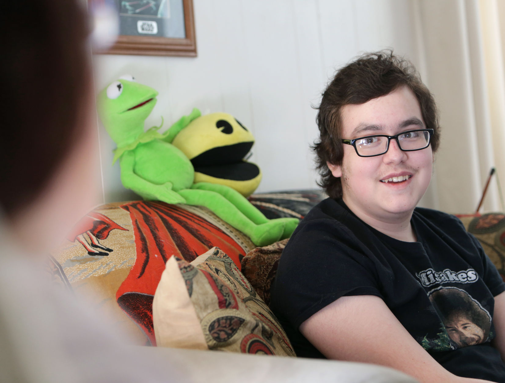 Sebastian at home, with Kermit